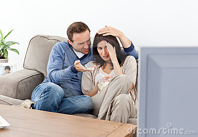 scared-couple-watching-horror-movie-17469376 (1) - Copy